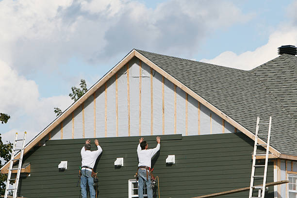 Professional Emergency Siding Repair technician working in Junction City, KY